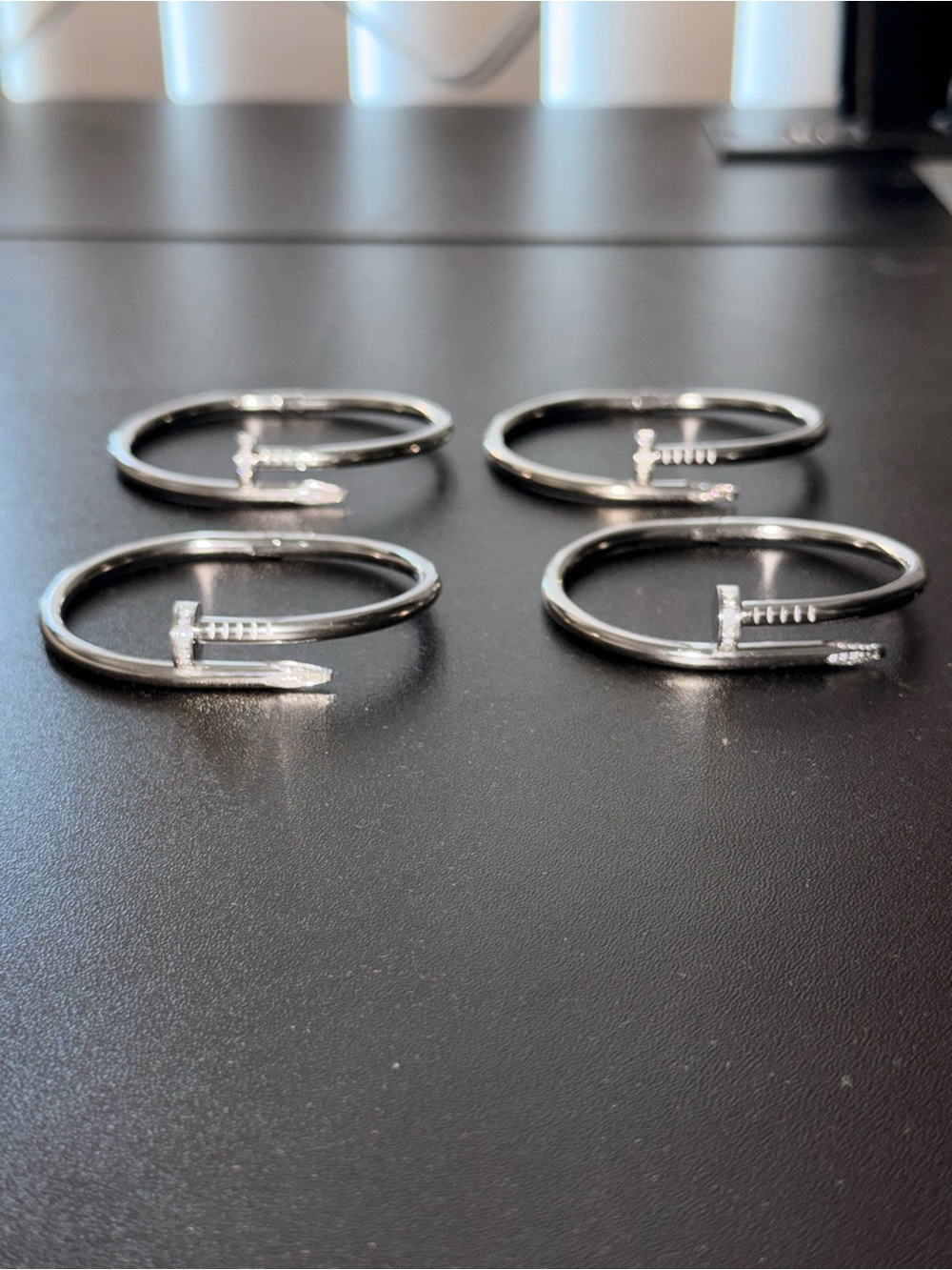 Set of 4 Silver Nail-Style Bangle Bracelets